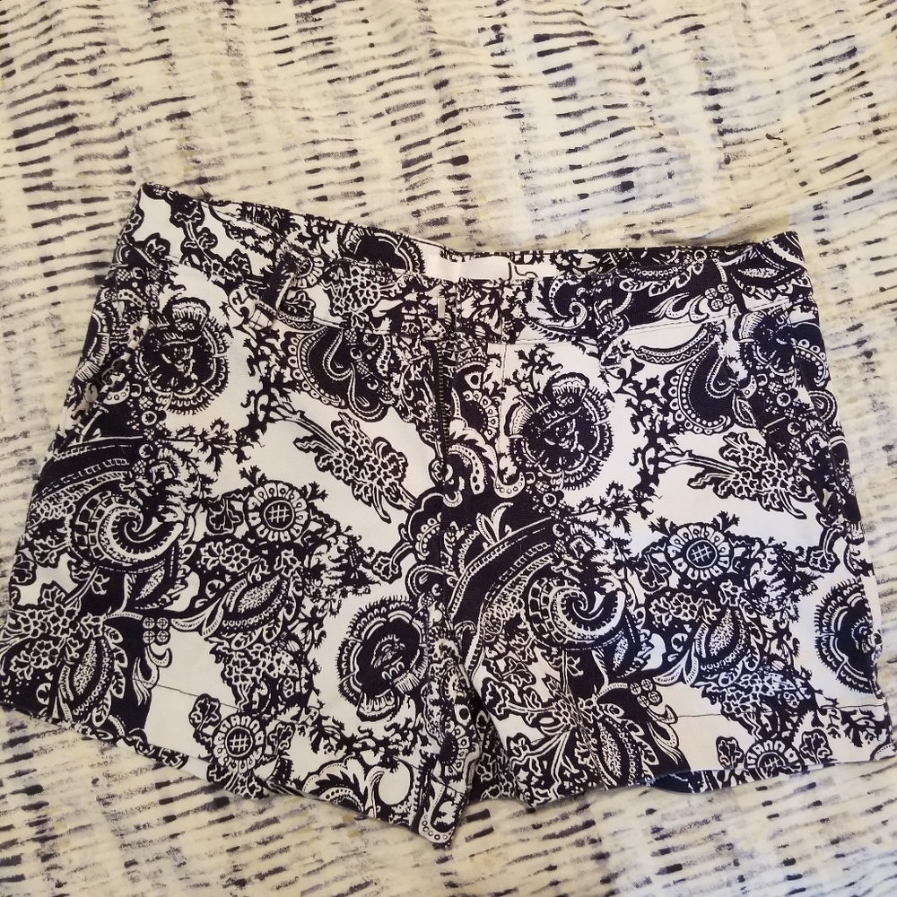 White and blue paisley shorts.  Size 2